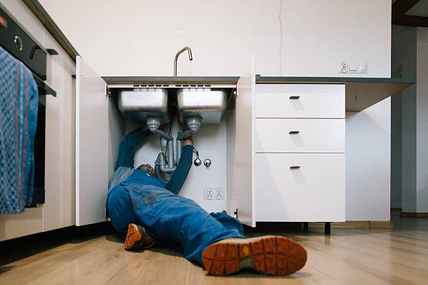 Professional Drain Cleaning technician working in Pembroke, MA